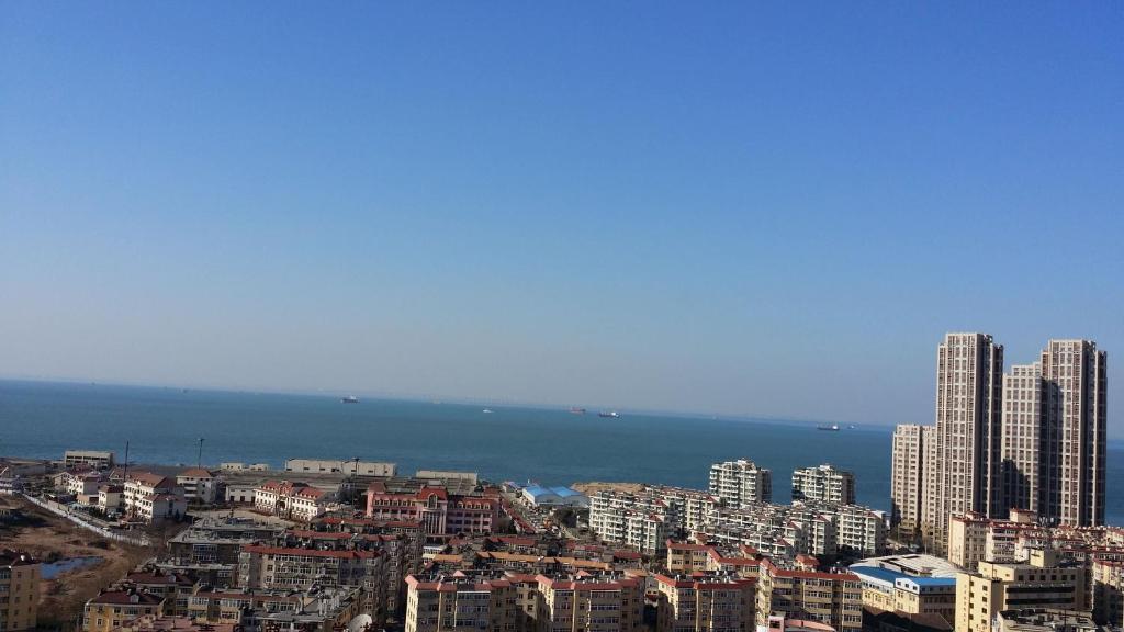 Super 8 Hotel Qingdao Railway Station Gui Zhou Road מראה חיצוני תמונה